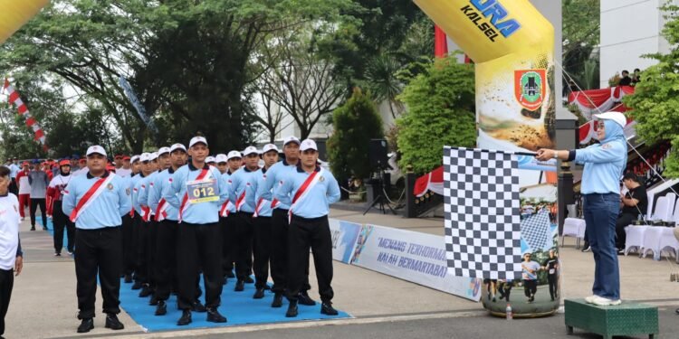 Disbunnak Kalsel Berpartisipasi di Lomba Gerak Jalan Pemprov Kalsel