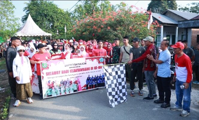 
					Ribuan Warga Kelurahan Gunung Tinggi bersama Yonif TP 828 BWM Meriahkan Jalan Santai  HUT RI ke-80,