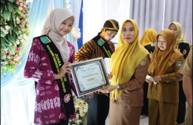 
					Puncak Harganas 2026: Novarinda Rizky Famia, Siswi SMA 1 Pagatan Dinobatkan Sebagai Juara 1 Duta GenRe Tanah Bumbu