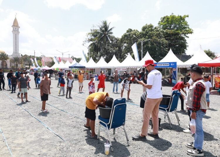 Lomba Estafet Air Meriahkan Aksi Merah Putih HUT ke-81 RI di Tanah Bumbu: Ajang Kekompakan dan Kebersamaan