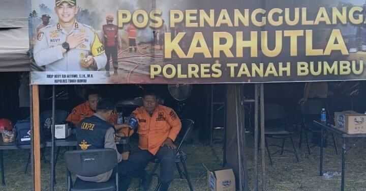 Antisipasi Dampak Karhutla, Si Dokkes Polres Tanah Bumbu Gelar Pemeriksaan Kesehatan dan Bagi Masker