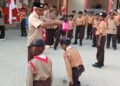 Khidmat, Puluhan Siswa SDN Pondok Butun Batulicin Resmi Dilantik Menjadi Pramuka Penggalang
